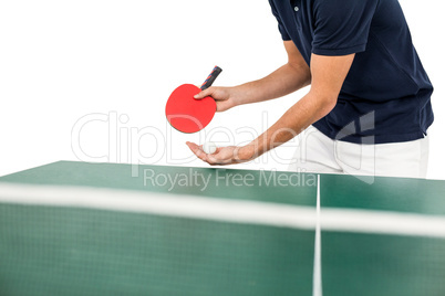 Mid section of athlete man playing table tennis