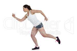 Side view of energetic female athlete running