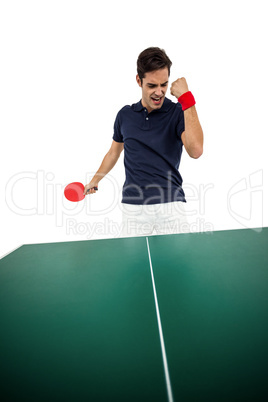 Happy male athlete posing after victory