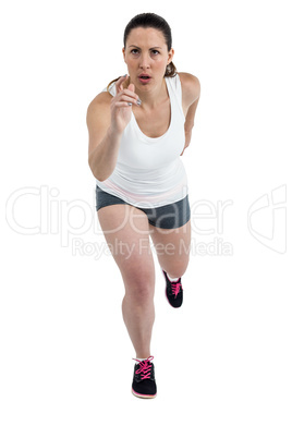 Energetic female athlete running