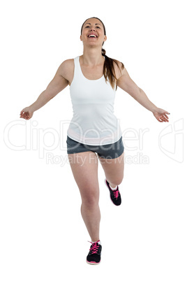 Energetic female athlete running
