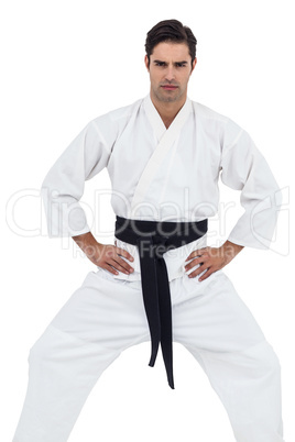 Portrait of fighter posing on white background