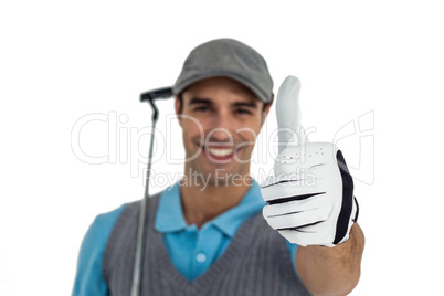 Portrait of golf player showing thumbs up