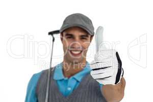 Portrait of golf player showing thumbs up
