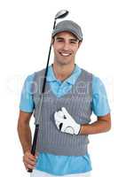 Portrait of golf player standing with golf ball and golf club