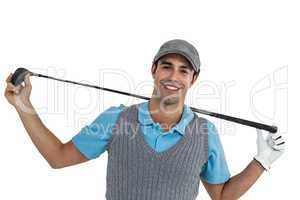 Portrait of golf player holding a golf club