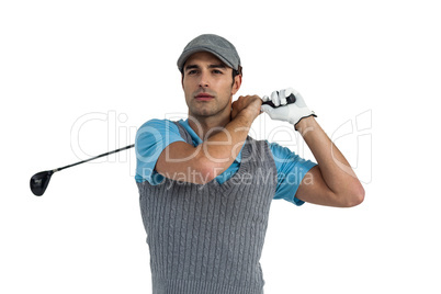 Golf player taking a shot