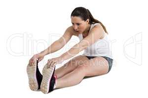 Athlete woman doing stretching exercise