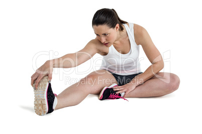 Athlete woman stretching her hamstring