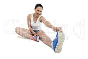 Athlete woman stretching her hamstring