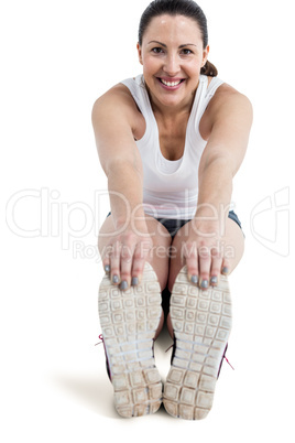 Portrait of athlete woman doing stretching exercise