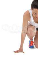 Athlete woman in ready to run position