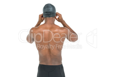 Rear view of swimmer in shirtless wearing swimmingÂ go