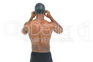 Rear view of swimmer in shirtless wearing swimmingÂ go