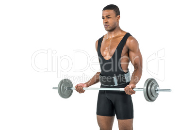 Bodybuilder lifting heavy barbell weights