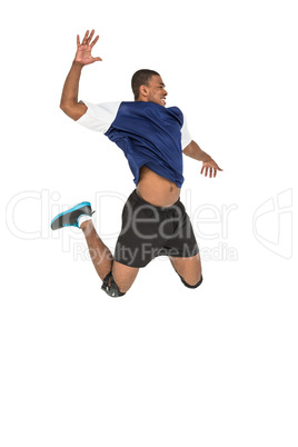 Sportsman posing while playing volleyball