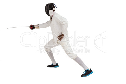 Man wearing fencing suit practicing with sword