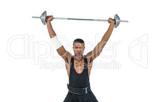 Portrait of bodybuilder lifting heavy barbell weights