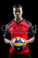 Sportsman holding a volleyball