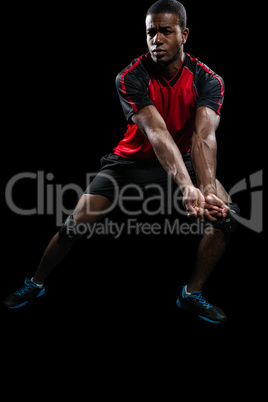 Sportsman posing while playing volleyball