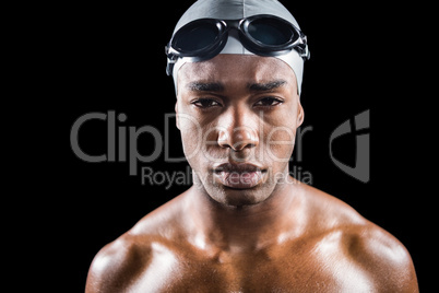Portrait of swimmer in swimmingÂ goggles and swimming