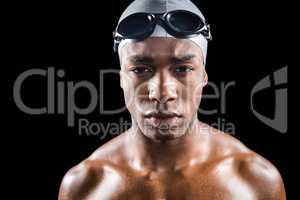 Portrait of swimmer in swimmingÂ goggles and swimming