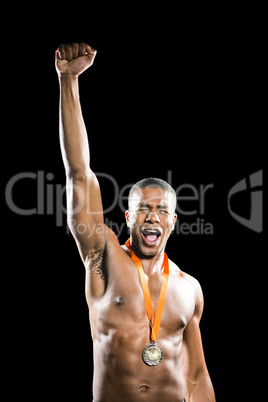 Happy boxer showing his silver medal