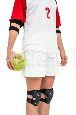 Sportswoman holding a ball