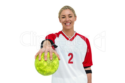 Sportswoman holding a ball