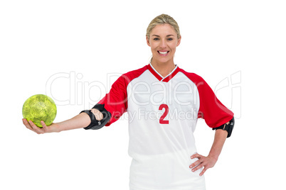 Sportswoman holding a ball