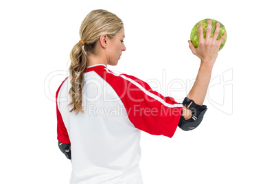 Sportswoman holding a ball Sportswoman holding a ball