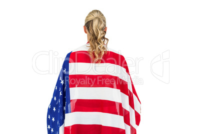 Athlete with american flag wrapped around his body