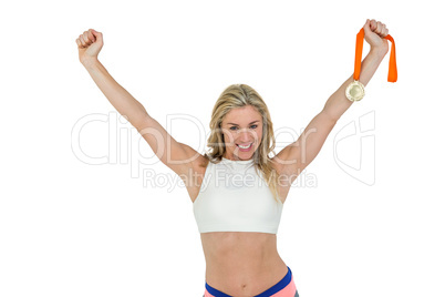 Athlete posing with gold medal after victory