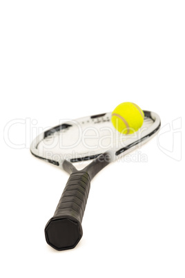 Tennis ball and racket on white background
