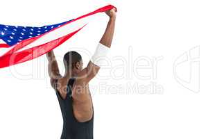 Athlete holding american flag