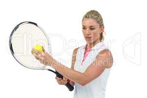 Athlete holding a tennis racquet ready to serve