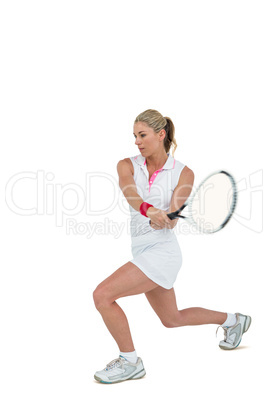 Athlete playing tennis with a racket