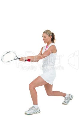 Athlete playing tennis with a racket