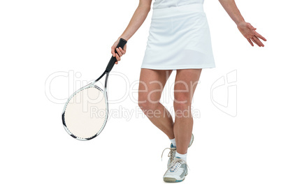 Athlete playing tennis with a racket