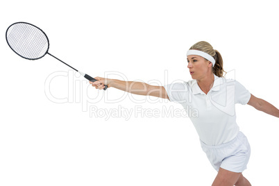 Female athlete playing badminton