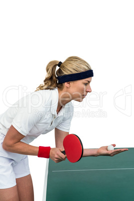 Female athlete playing table tennis