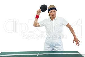 Female athlete playing table tennis