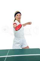 Female athlete playing table tennis