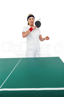 Female athlete playing table tennis