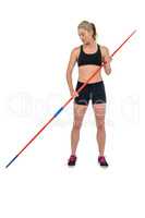 Athlete standing with javelin