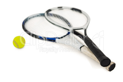 Tennis ball and rackets on white background