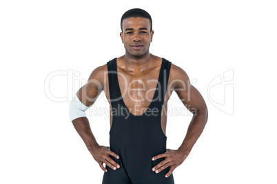 Athlete standing with hand on hip