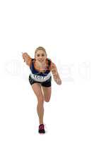 Female athlete running on white background