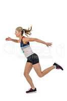 Female athlete running on white background