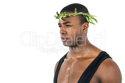 Athlete wearing a laurel wreath on white background